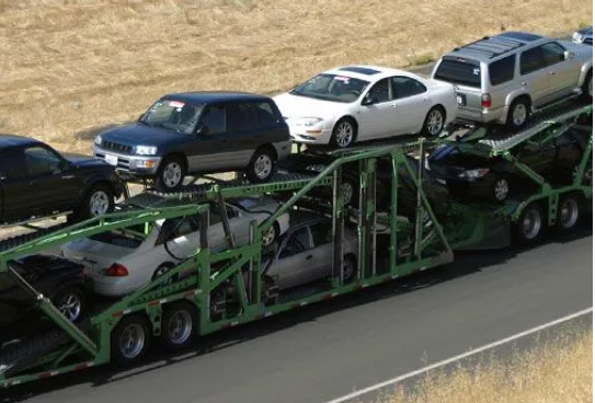 Picture of a filled car transport trailer